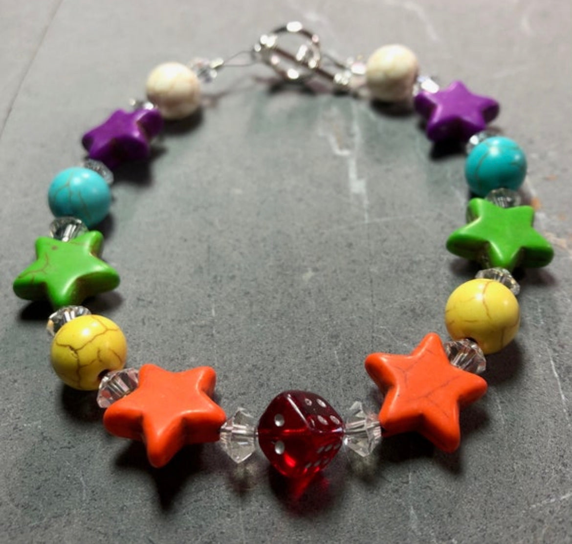 Roo Island Carousel and Dice Neopets inspired rainbow bracelet